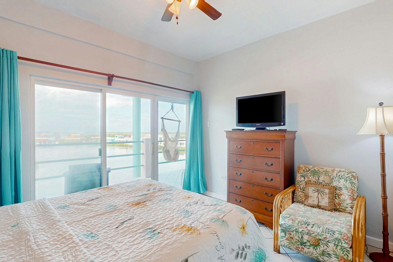 Bedroom opening to the balcony